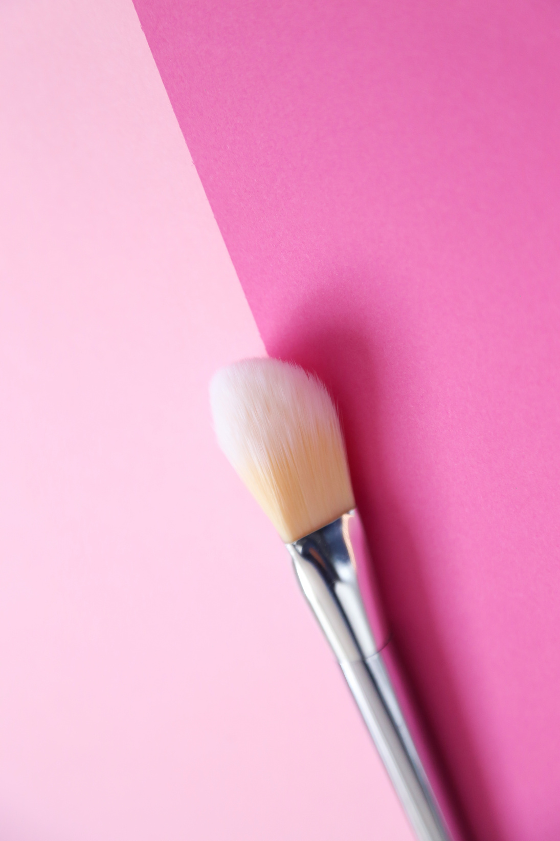 Make-up Brush on Pink Surface